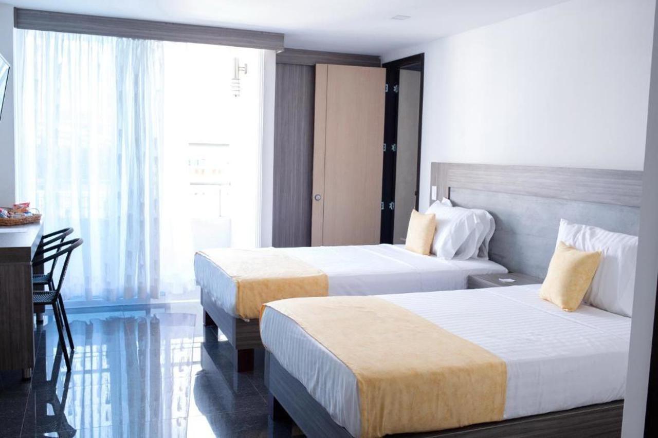 Hotel Be Suites Cali Bagian luar foto