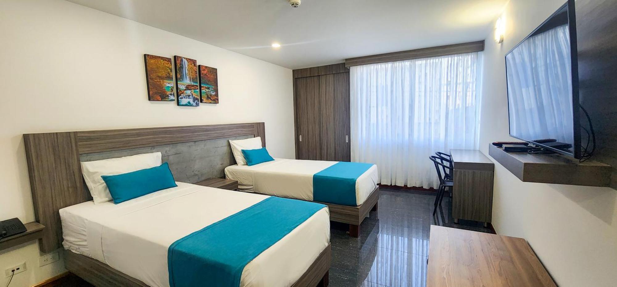 Hotel Be Suites Cali Bagian luar foto