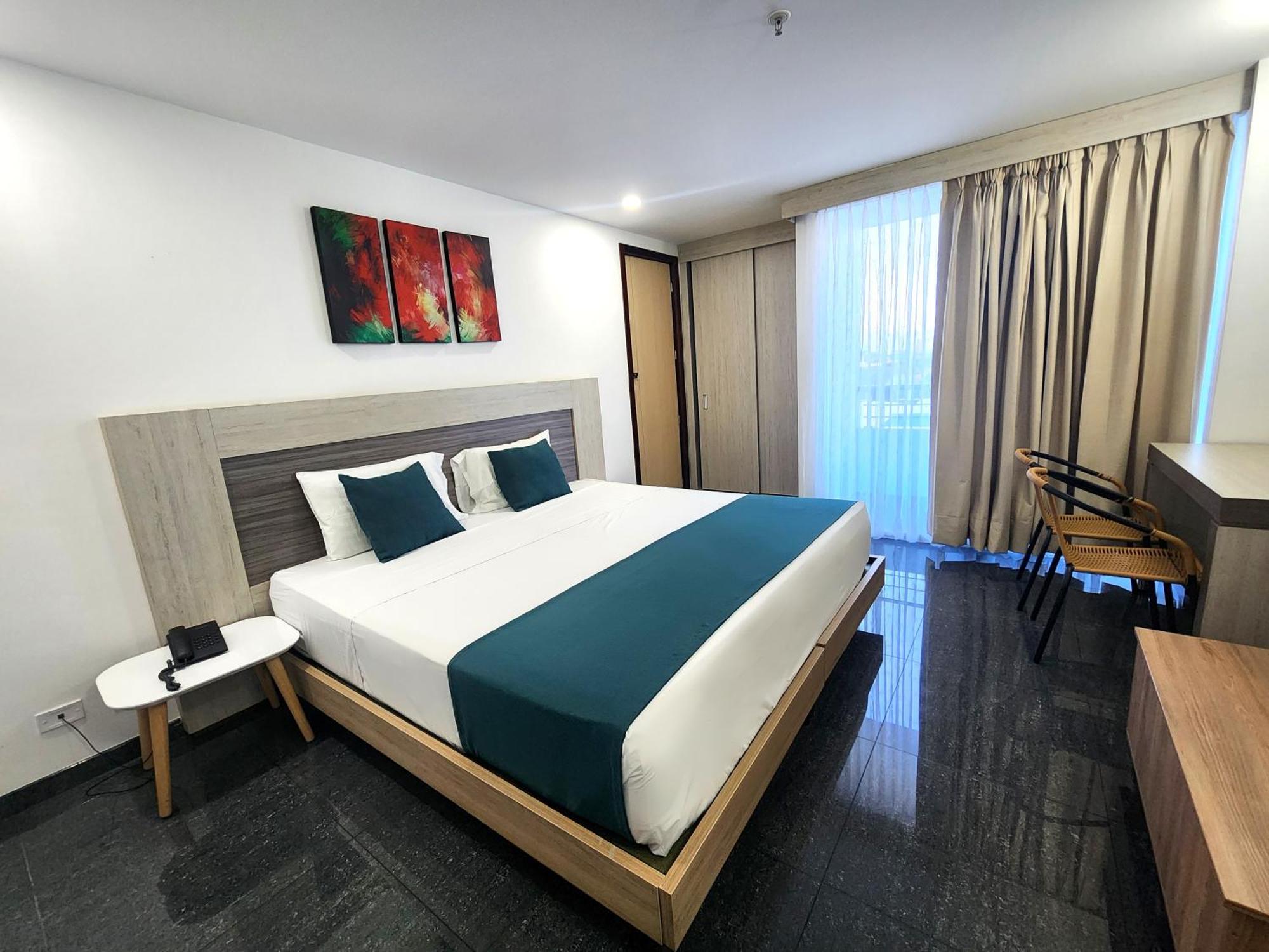 Hotel Be Suites Cali Bagian luar foto